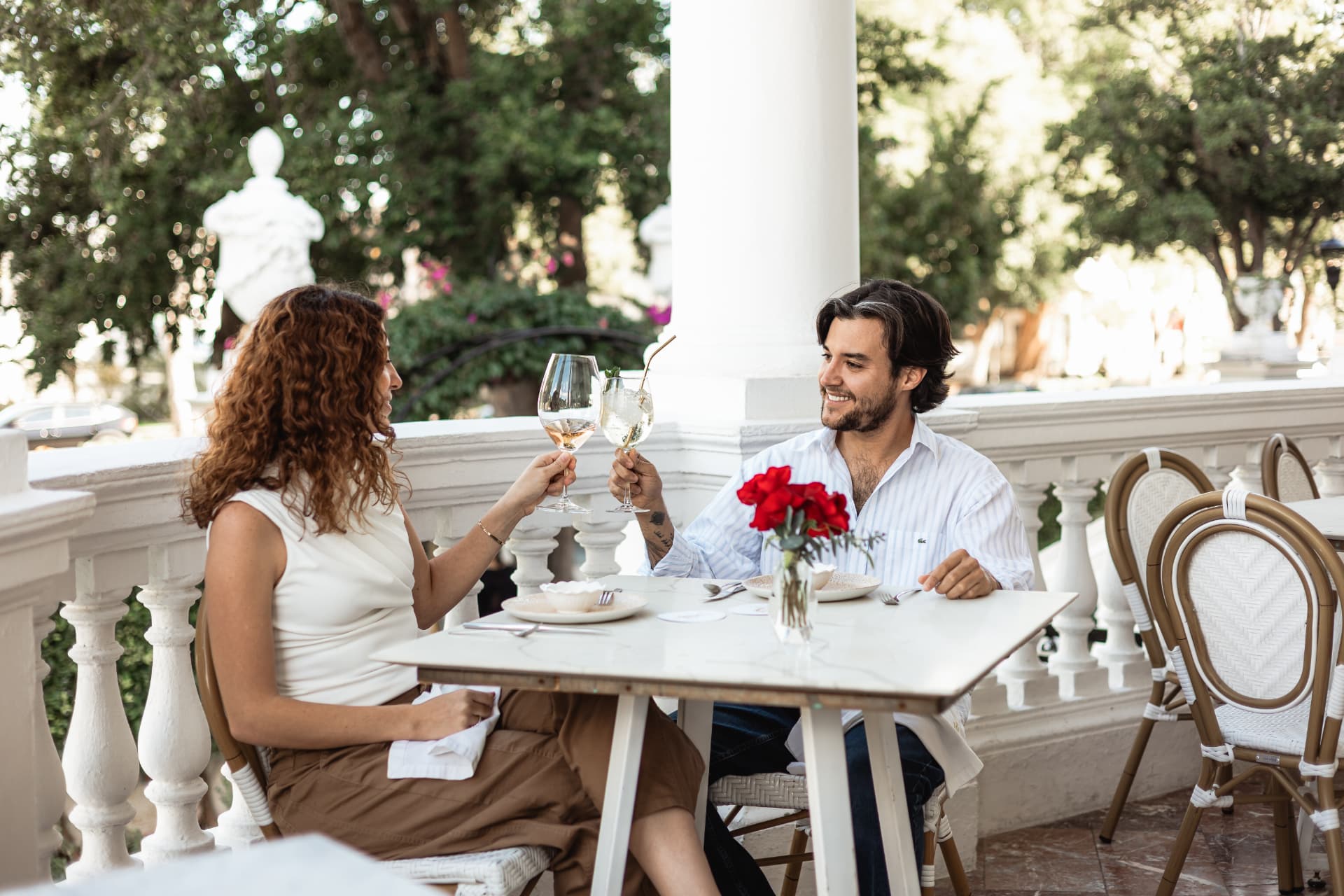 A couple toasting in the Yerba Santa dining room